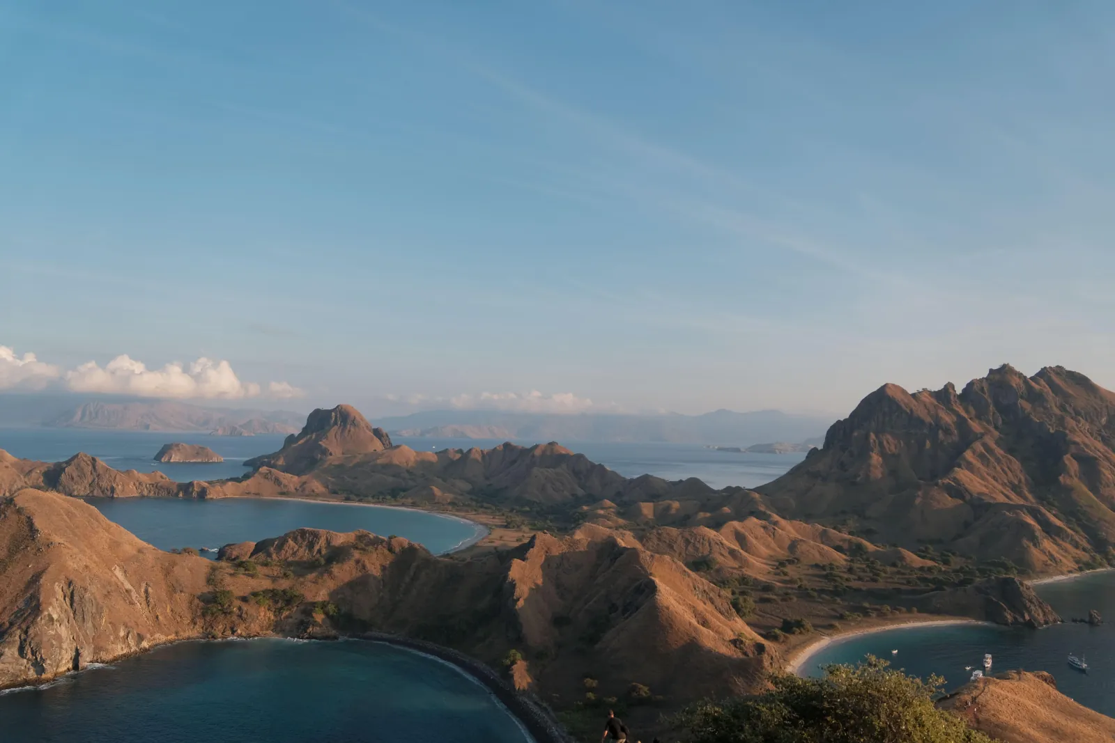 The three bays of Padar Island seen from the summit trail at first light